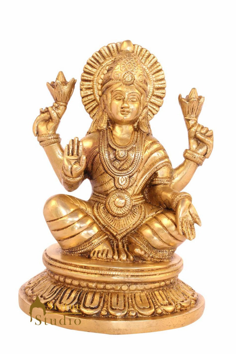 Brass hindu goddess of wealth sitting on base religious room décor 8"